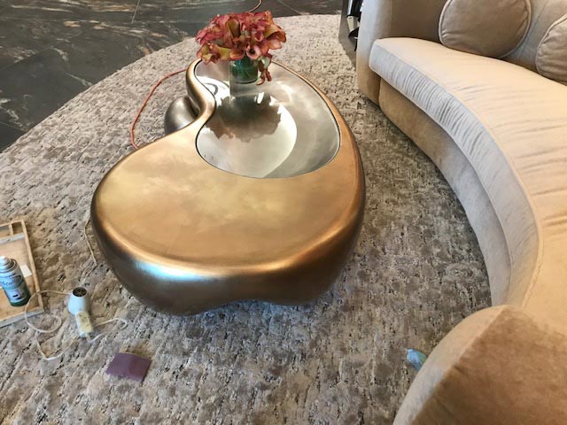 Gold like color table and a sofa