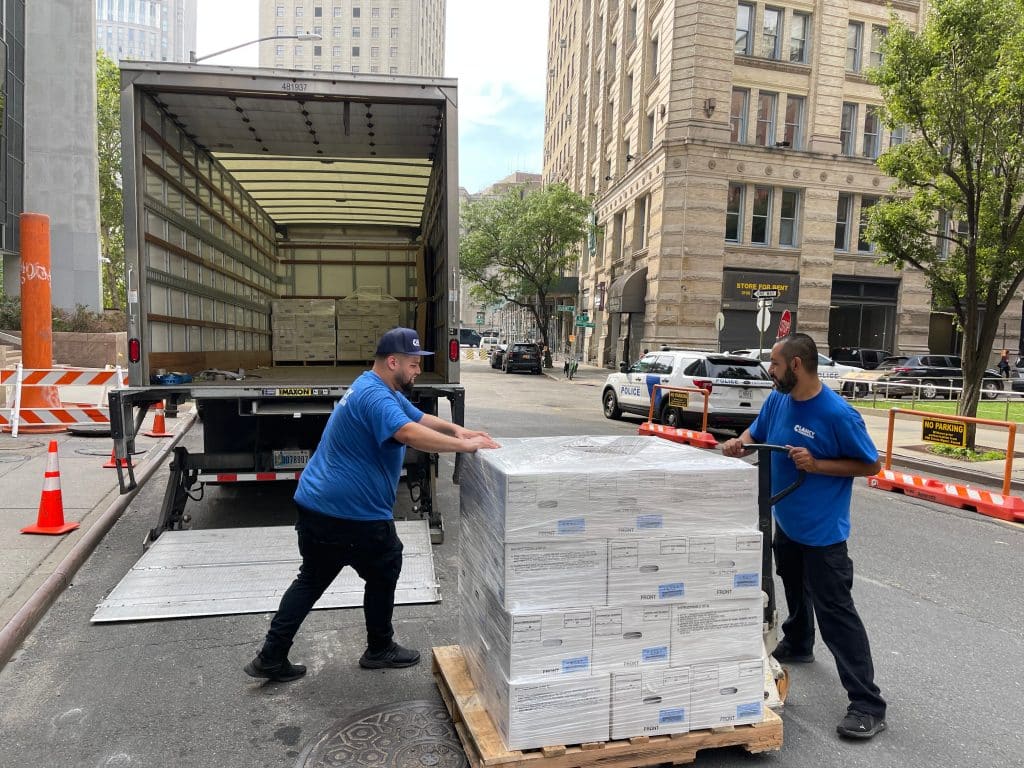 2 movers pushing objects